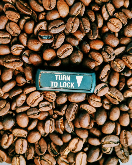 a close up of a bunch of coffee beans
