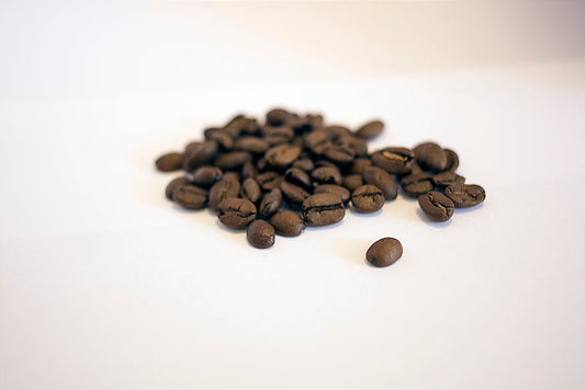 coffee beans on white surface