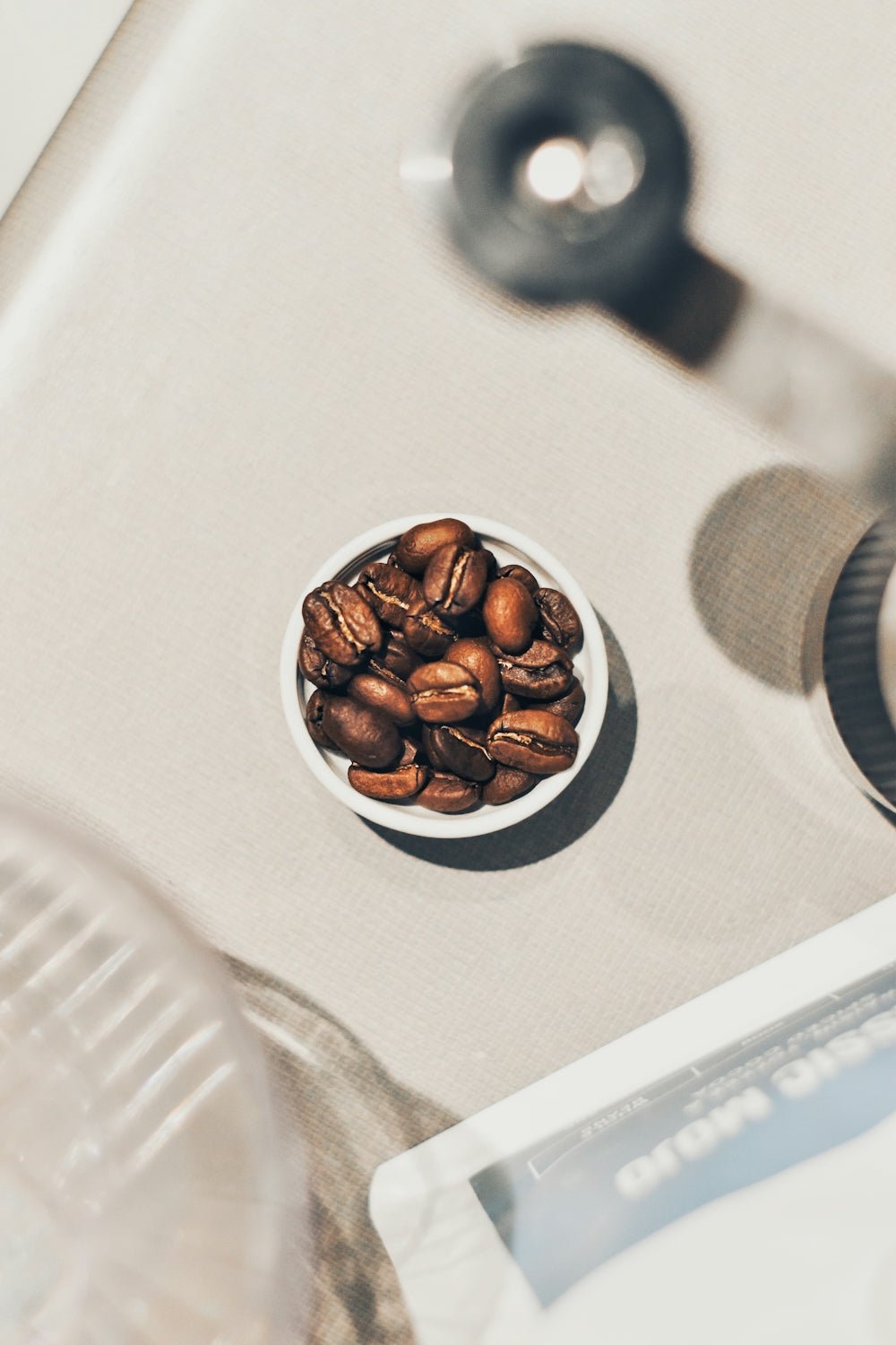 a bowl of nuts sitting on top of a table