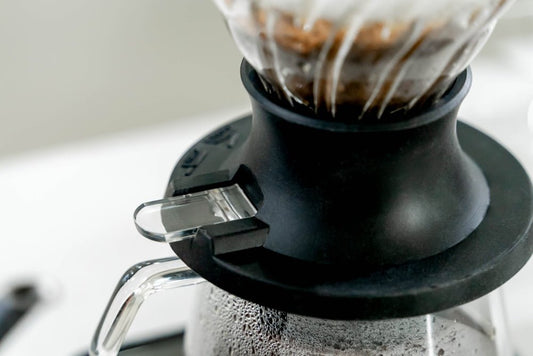 a close up of a blender with food in it