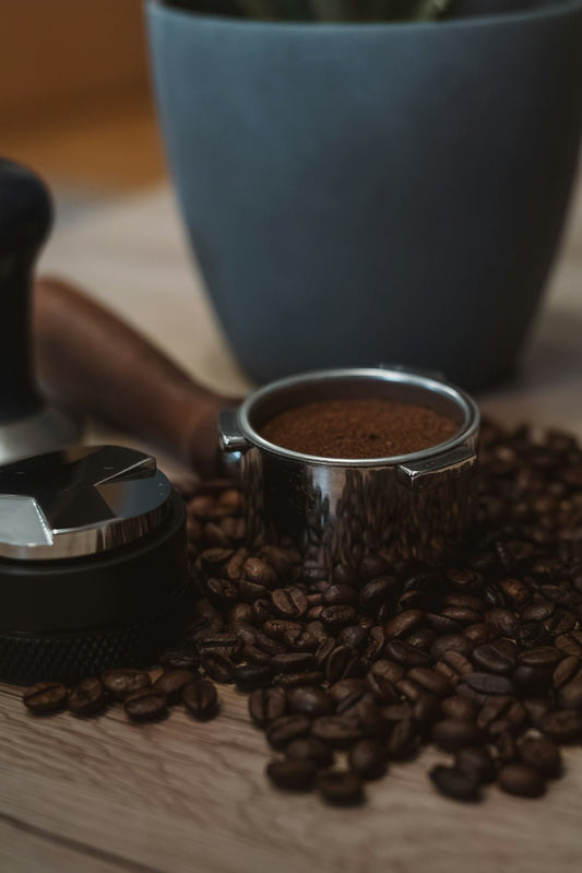 A cup of coffee sitting on top of a wooden table